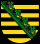 Wappenschild neunmal von Schwarz und Gold geteilt, aufgelegter grüne Rautenkranz